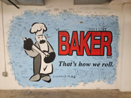 A black and white figure of a baker holding a rolling pin stands next to the
title 